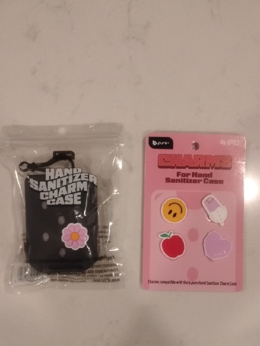 Black Silicone Hand Sanitizer Case with Pink Flower Charm